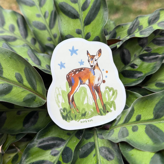 Sticker of a deer on a leafy green plant